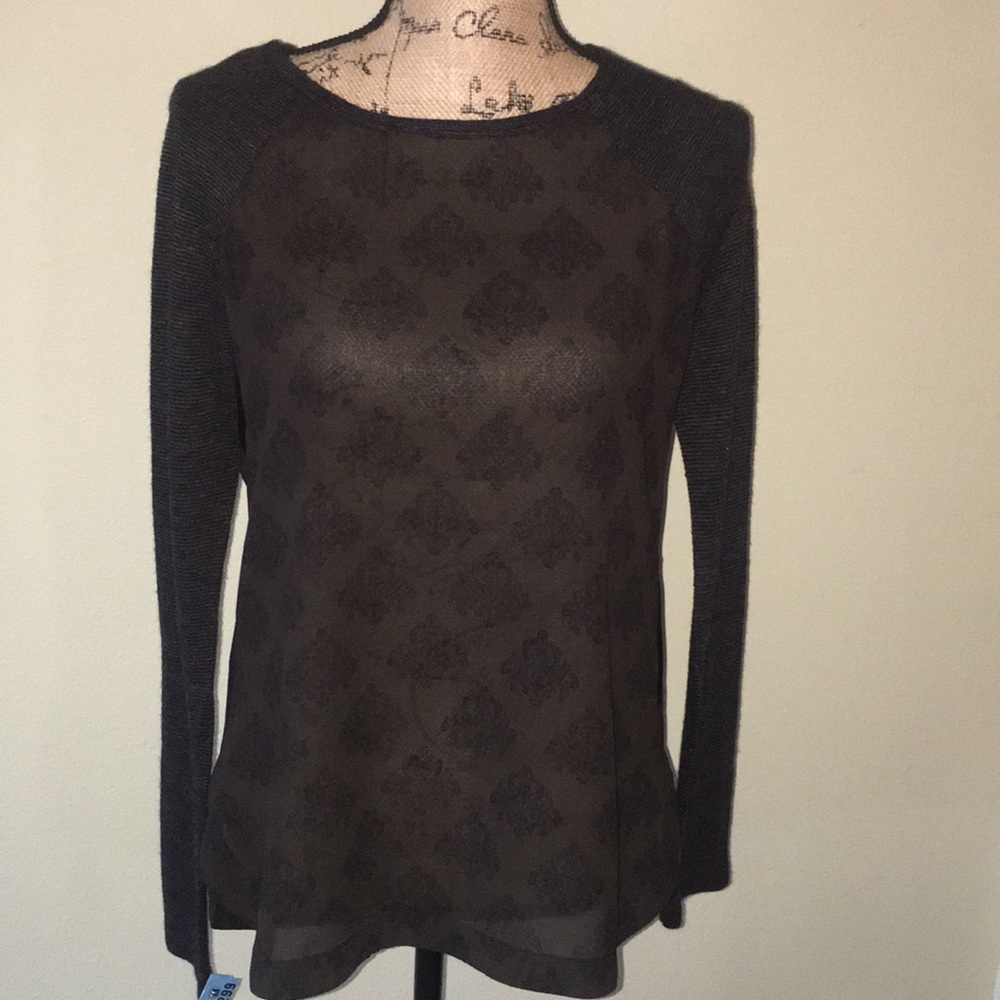 Sheer olive top.